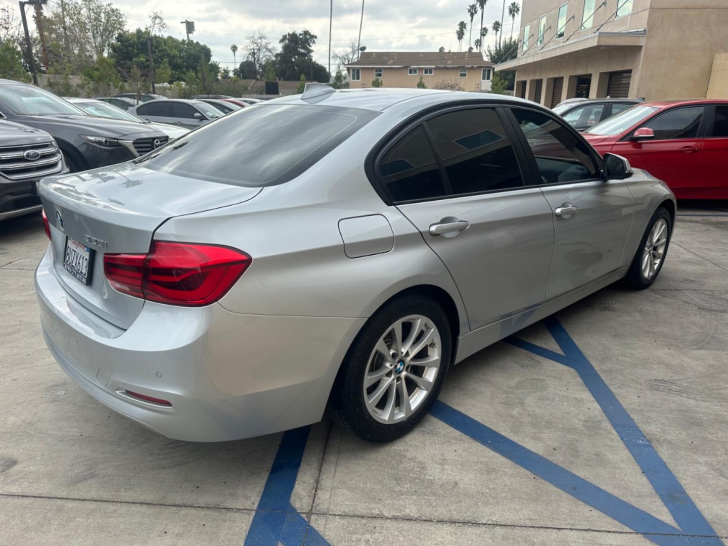 2017 Gray /Black BMW 3-Series Leather (WBA8E1G34HN) with an 4 Cylinder engine, Automatic transmission, located at 30 S. Berkeley Avenue, Pasadena, CA, 91107, (626) 248-7567, 34.145447, -118.109398 - Low Miles!! This 2017 BMW 3-Series 320i Sedan looks and drives well. Looking for a top-notch sedan in Pasadena, CA? Your search ends here! Feast your eyes on our remarkable 2017 BMW 3-Series 320i Sedan with only 54,413 miles on the odometer. This is considered low mileage, providing assurance of its - Photo#5